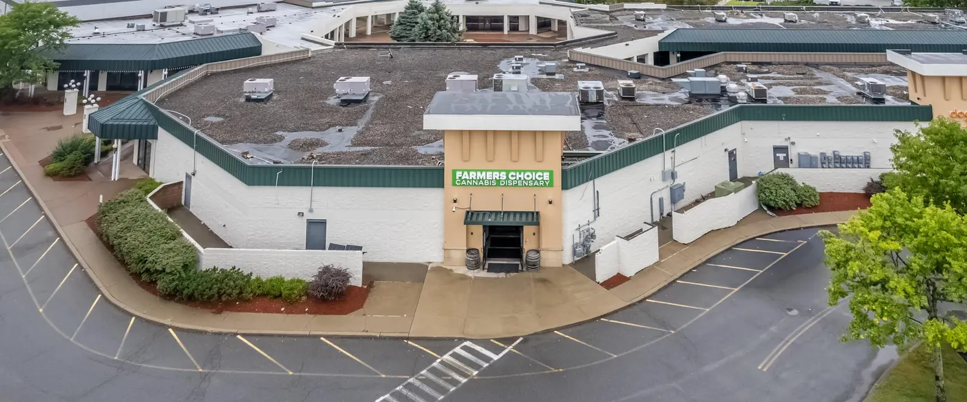 Aerial view of Farmers Choice dispensary building and parking lot
